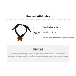 Close-up of floral fabric necklace with brown acrylic bow pendant and product dimensions