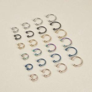 Set of horseshoe piercing rings in multiple colors and sizes for nose and ears