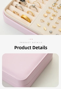 Detail view of pink PU leather jewelry box with ring slots and soft velvet lining