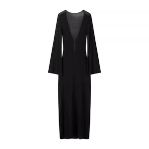 Detail of black V-neck knit maxi dress showing mesh texture and flared sleeve design