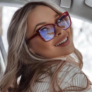 Stylish red TR90 cat-eye blue light blocking glasses for women, shown on a smiling model