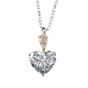 Minimalist silver heart necklace featuring a radiant yellow cubic zirconia pendant
