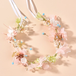 Elegant floral bridal headband with pink flowers, gold butterflies and white ribbon