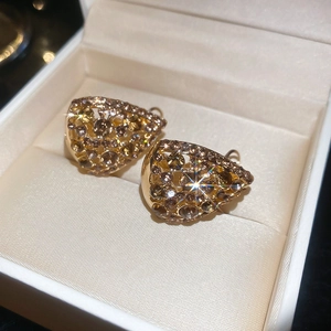 French vintage champagne rhinestone teardrop earrings in golden finish with hollow design