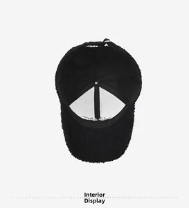 Detailed interior of winter fleece baseball cap showing lining and adjustable buckle