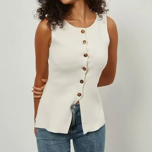Elegant sleeveless knit top in beige with button front and fishtail skirt suit