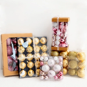 Golden and pink assorted Christmas ball ornaments set with various textures in a gift box