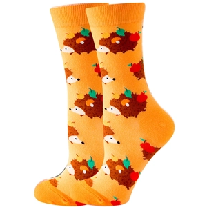 Detail of orange mid-calf socks with cute cartoon hedgehog and apple patterns