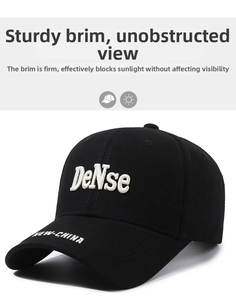 Detail of black baseball cap featuring 3D DeNse embroidery and New-China brim text