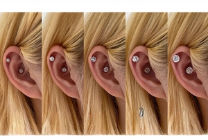 Detailed comparison of five zircon stud sizes from 4mm to 8mm on different ear positions
