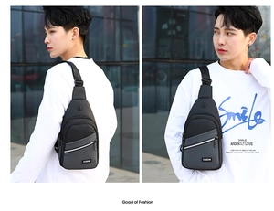 Detailed view of high-capacity oxford fabric chest bag with multiple zipper layers and headphone hole