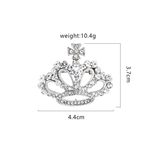 Elegant rhinestone crown brooch with cross detail and dimensions 4.4cm by 3.7cm