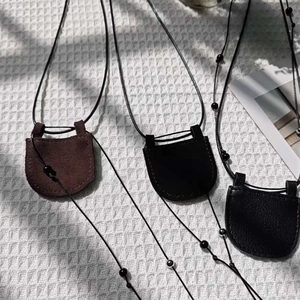 Minimalist mini crescent bag necklace set in brown and black leather style
