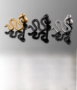Detailed view of snake-shaped titanium steel stud earrings in silver, gold and black