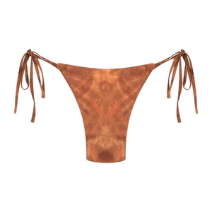 Detail of marble print tie-side bikini bottoms with adjustable high-cut design