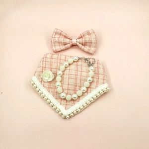 Pink tweed pet accessory set with plaid bandana, bow tie and pearl necklace