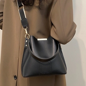 Classic black bucket bag with a stylish wide strap and smooth PU leather finish for women