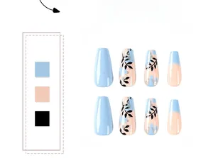Detail of medium-long coffin press-on nails with blue and gold leaf foil patterns