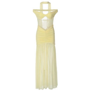 Detail of light yellow mesh panels and ruched waist on a long off-shoulder dress