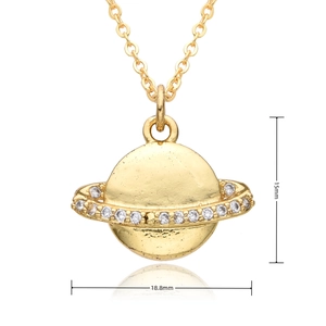 Detailed view of golden Saturn pendant with white rhinestones measuring 18.8mm by 15mm