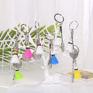 Badminton themed keychain set with mini metal rackets and colorful shuttlecocks