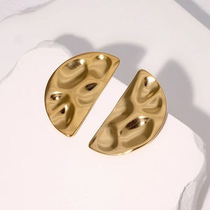 Minimalist gold geometric semicircular earrings with textured hammered finish on stone