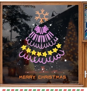 Pink hand-drawn Christmas tree window sticker with Merry Christmas text on glass