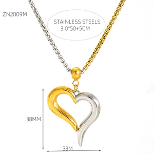 Detail shot of heart pendant with two-tone finish, size 38x33mm on 50cm chain