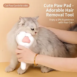Brosse de toilettage mignonne en patte de chat blanche pour poils et massage d'animaux