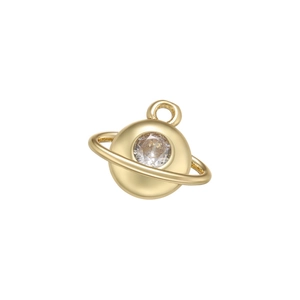 Macro detail of a gold planet pendant featuring a sparkling clear zircon stone center