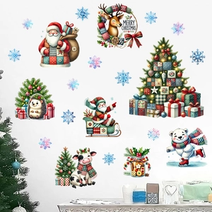 Christmas wall stickers featuring Santa, reindeer and snowflakes on white wall