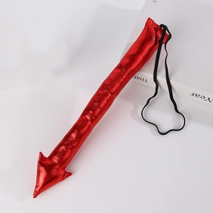 Glossy red devil tail costume accessory with metallic finish and pointed arrow tip