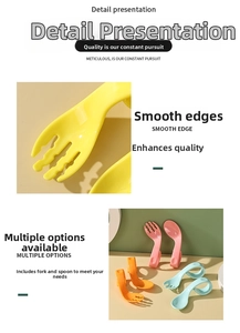 Detailed close-up of colorful curved baby training spoons and forks with smooth edges