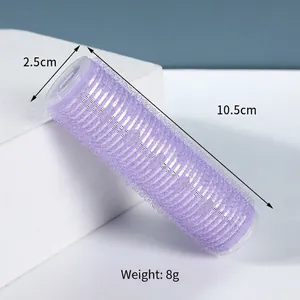 Macro view of a 10.5cm purple velcro hair roller showing diameter and weight details