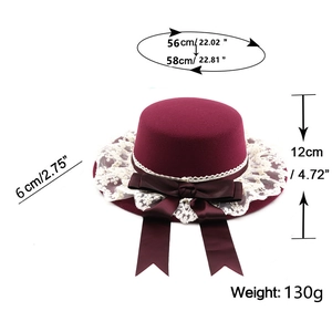 Detail view of burgundy wool bucket hat with lace trim and size measurement specifications