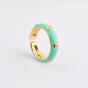Close-up of mint green enamel ring with gold plating and sparkling AAA zircon accents