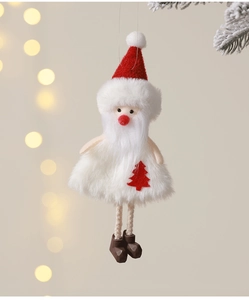 Detail of plush Santa Claus ornament with red hat and knitted legs hanging on Christmas tree