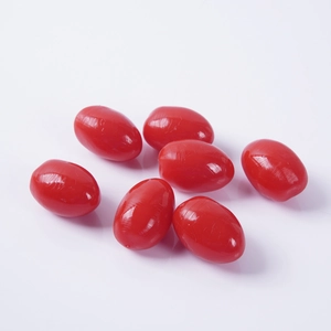 Set of seven realistic artificial cherry tomato models with glossy red finish and texture