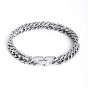 Detailed view of silver stainless steel Cuban link bracelet with a fold-over jewelry clasp
