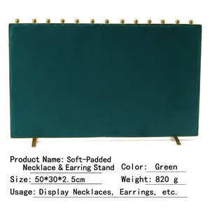 Green velvet jewelry display board with gold metal hooks and dimensions 50x30x2.5cm