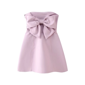 Pink strapless A-line mini dress with a large bow decoration and smooth fabric