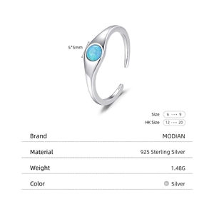 Exquisite S925 sterling silver open ring featuring a round blue opal stone in retro style