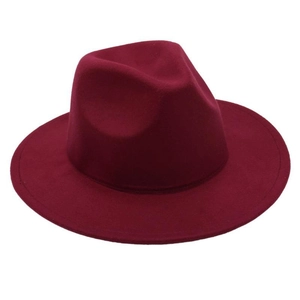 Macro detail of the wide-brimmed burgundy wool felt fedora with elegant stitching