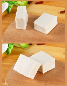 Detailed close-up of realistic PVC tofu blocks with fabric texture on a wooden board