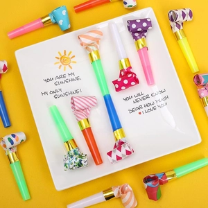 Colorful party blowouts with polka dots and stripes for birthday celebrations