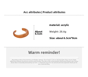 Close-up of amber brown acrylic cuff bracelet with 6.5cm inner diameter and 28.6g weight