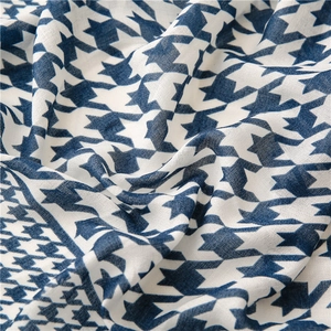 Blue and white houndstooth scarf with star geometric pattern and soft linen-feel texture