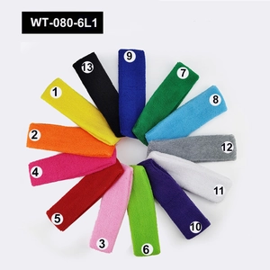 Multi-colored cotton sports headbands in 13 vibrant options with soft towel texture