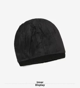 Detail view of the thick fleece lining inside the black winter knit beanie hat