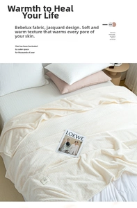 Detailed view of the soft waffle textured pineapple pattern flannel blanket fabric in beige